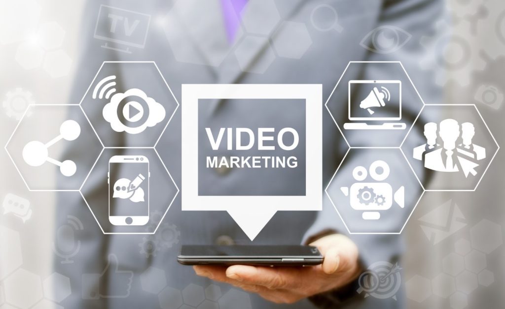 a person holding a device for video marketing