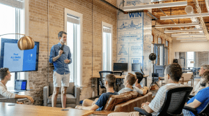 man presenting to an audience